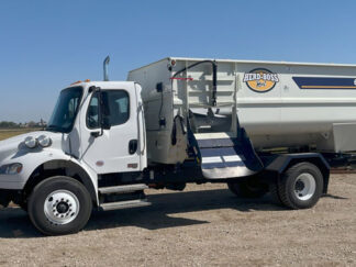 ***NEW*** Herd-Boss 6160 Reel Feed Mixer Mounted on a Freightliner Truck