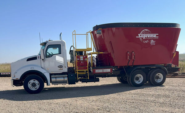 ***NEW*** Supreme 1250TM Vertical Mixer on a Kenworth Truck