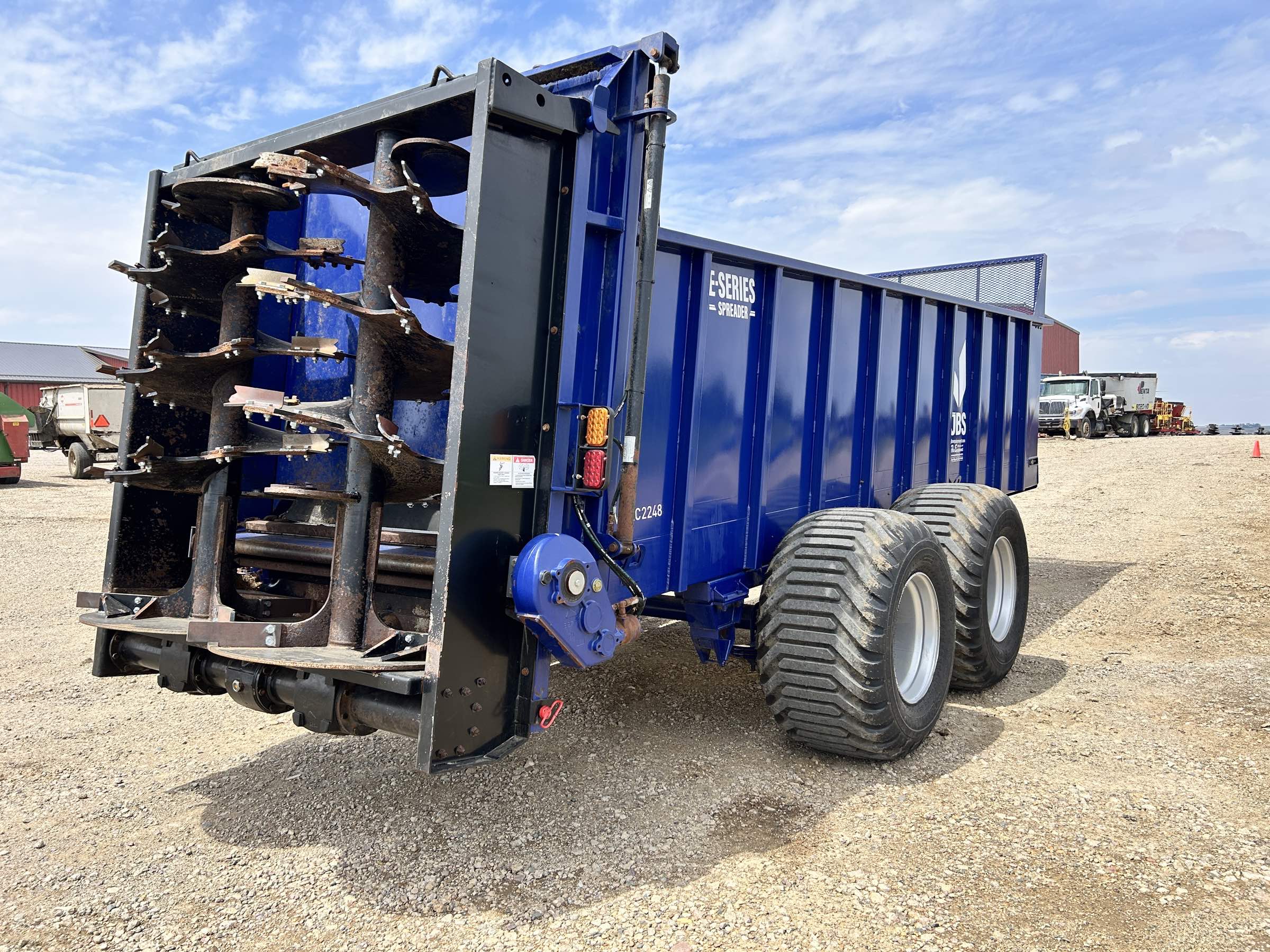 Used 2023 JBS 2248-3.0 Manure Spreader! Bulk head, bull pull, small 1000 CV PTO, light kit! Log chain single web, tandem axle, spring ride suspension!