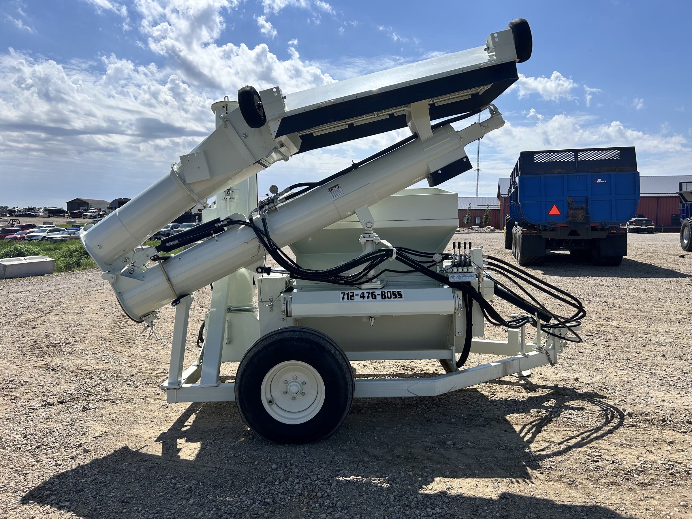 Used 2025 Herd-Boss/Renn RMC 48 roller mill! One owner trade, with less than 100,000 bushel of corn through it! 16" X 48" 5 cut cast rolls, 12" X 12' folding inlet hydraulic truck hopper, 1:1 drive, 14" X 12' folding discharge auger with Hydraulic controls. Powered by a 540 PTO.